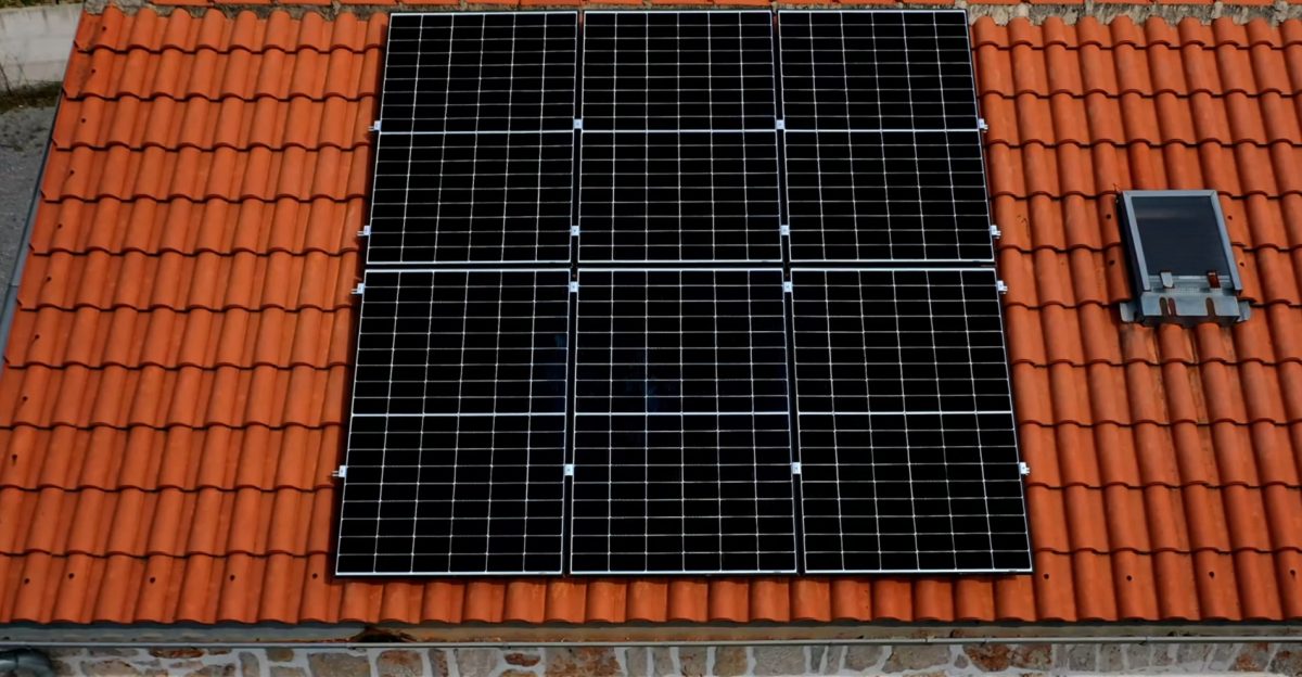 Tesla solar roof cost vs panels